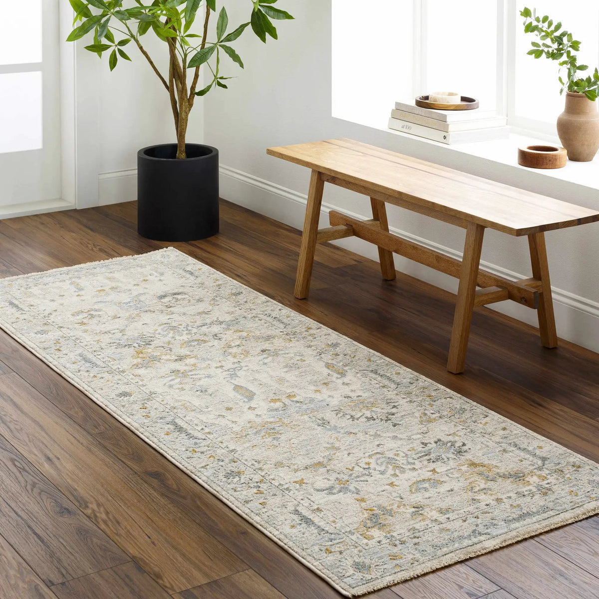 Emile Textured Rug with Fringes, installed in a room
