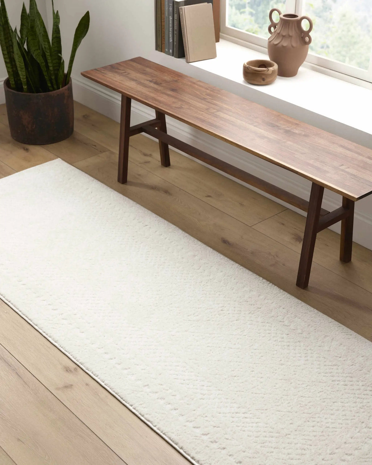 Julio Ivory Area Rug, installed in a room 3