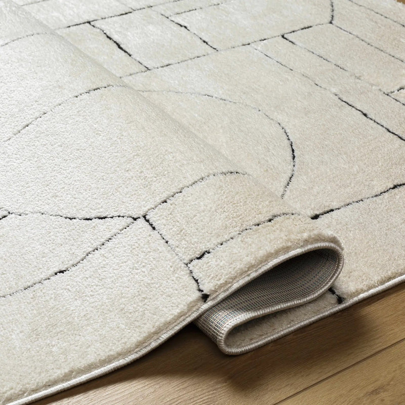 Keats Black & White Area Rug by Boutique Rugs