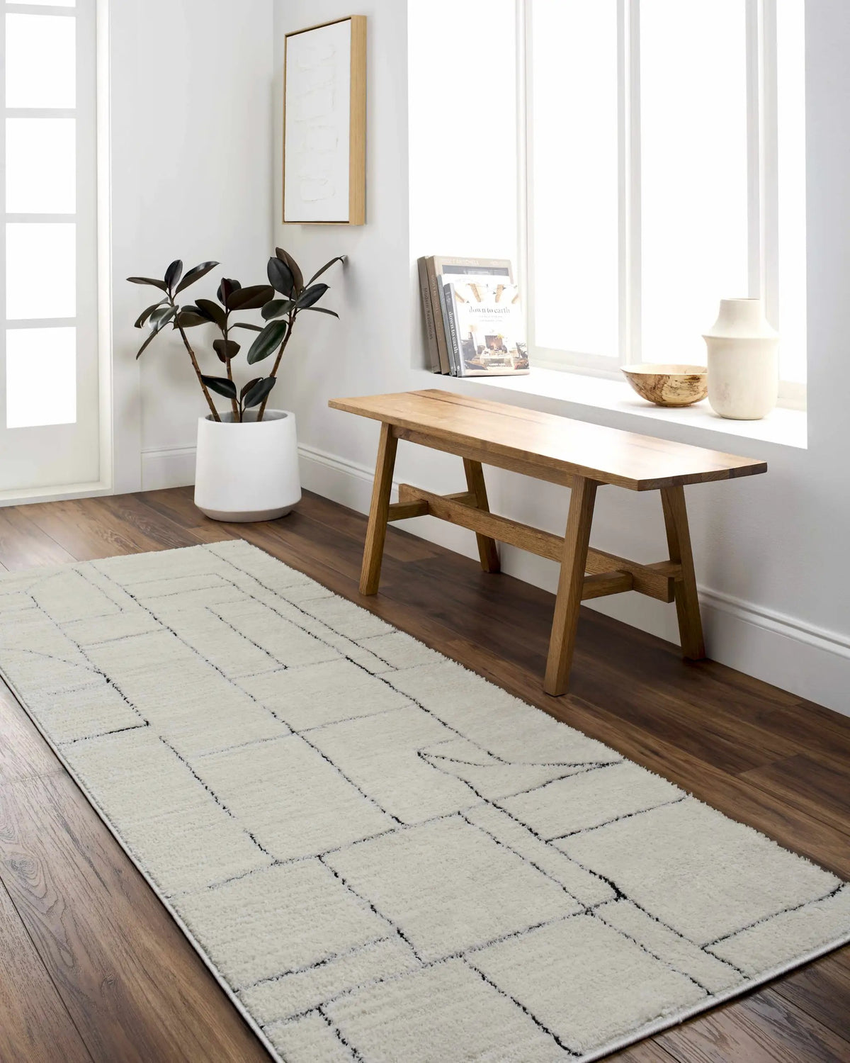 Keats Black & White Area Rug, installed in a room 4