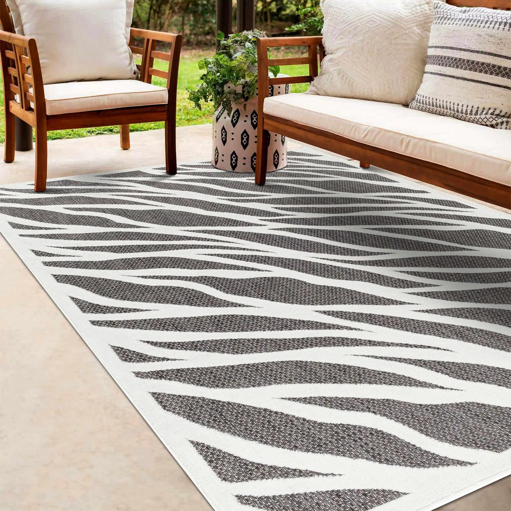 Astra Zebra Print Black Outdoor Rug - Clearance by Boutique Rugs