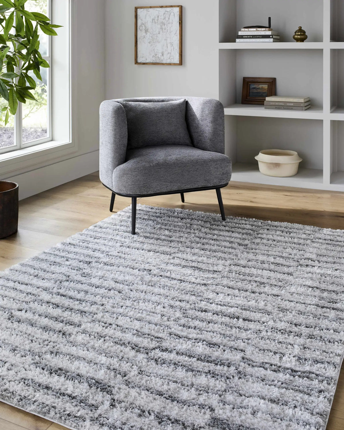 Anevay Dark Gray Area Rug, installed in a room