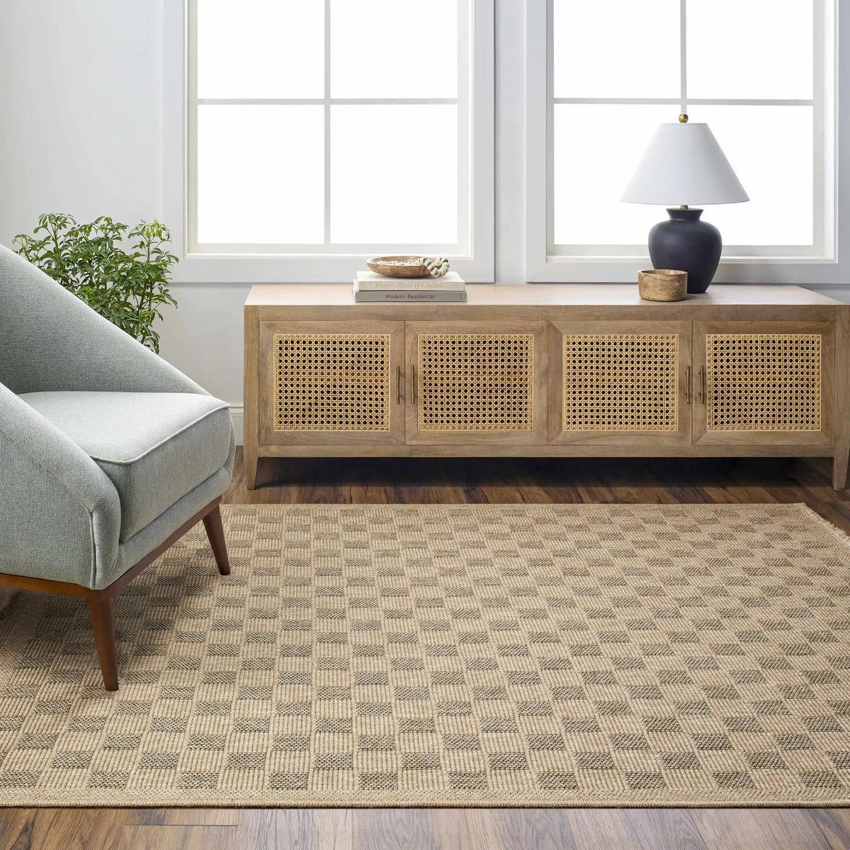 Jurek Beige & Brown Checkered Outdoor Area Rug, installed in a room