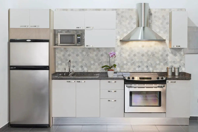Arabescato Carrara 2" Hexagon Mosaic Tile Honed Marble in a finished room