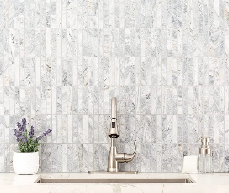 Capri Blue 1x6 Stack Pattern Honed Marble Mosaics in a finished room