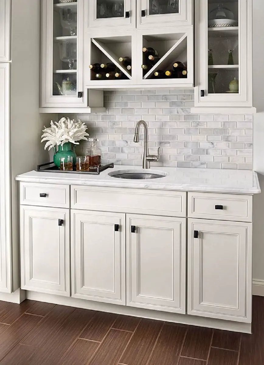Greecian White Beveled Subway Tile 2x4 Marble Mosaics in a finished room
