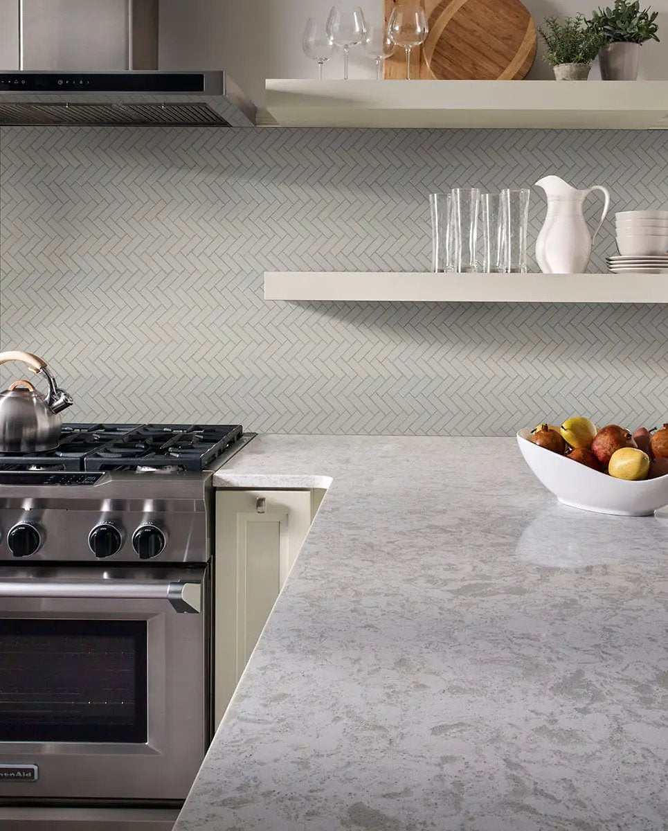 Gray Glossy Herringbone Mosaic Porcelain in a finished room