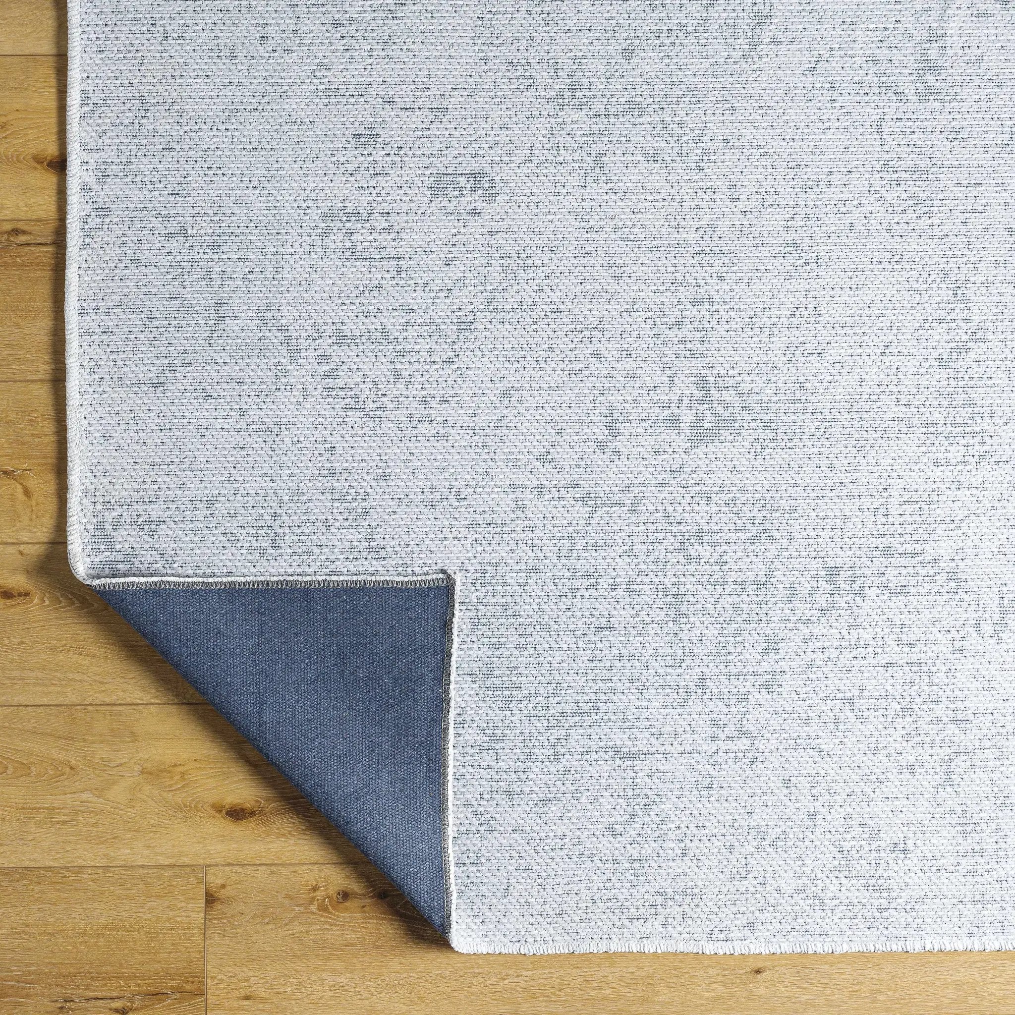Isako Light Blue Solid Washable Rug - Clearance by Boutique Rugs