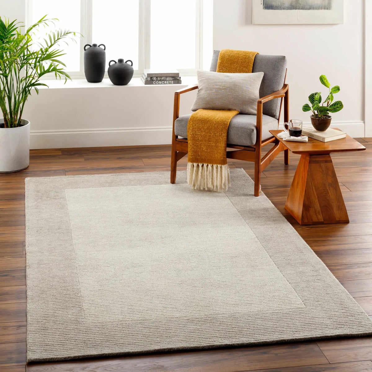 Amadi Wool Area Rug, installed in a room
