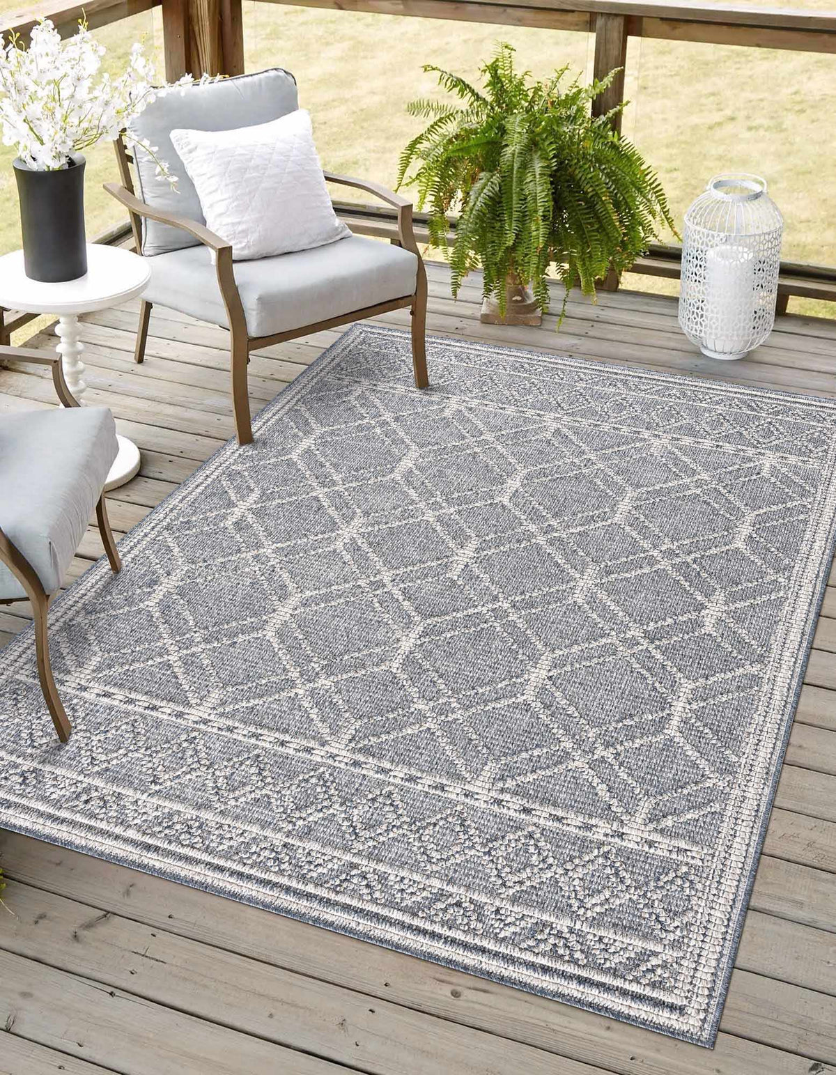 Diah Gray Blue & Bone Outdoor Area Rug - Clearance, installed in a room