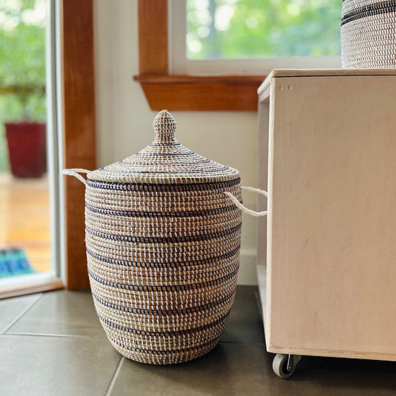 Striped White + Navy Medium Basket, installed in a room