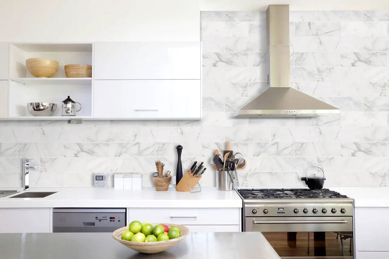 Calacatta Cressa Marble Subway Tile 4x12 Honed Mosaics in a finished room
