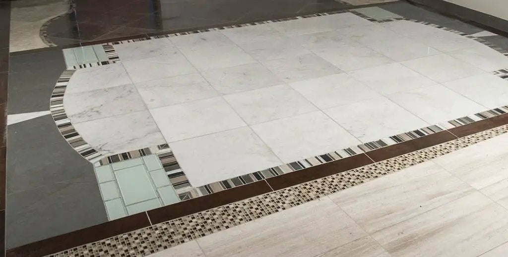 Carrara White Polished Pencil Marble Mosaics 3/4x3/4 in a finished room