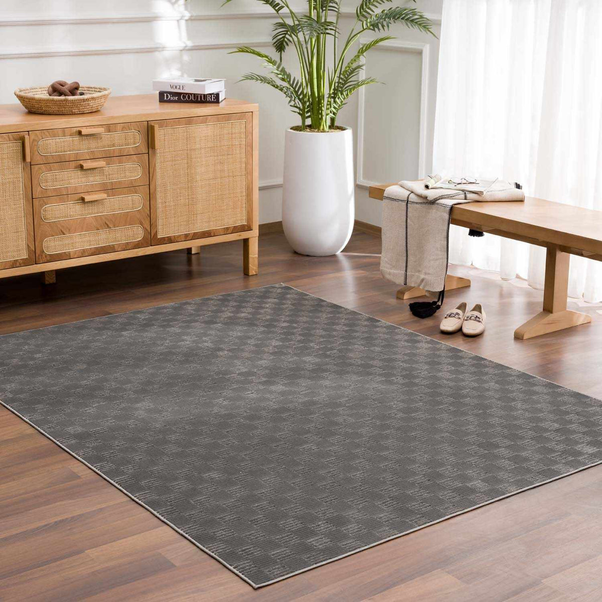 Truls 3D Checkered Washable Rug - Black, installed in a room