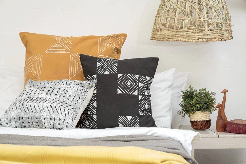 Matika Black Grid Pillow Cover, installed in a room