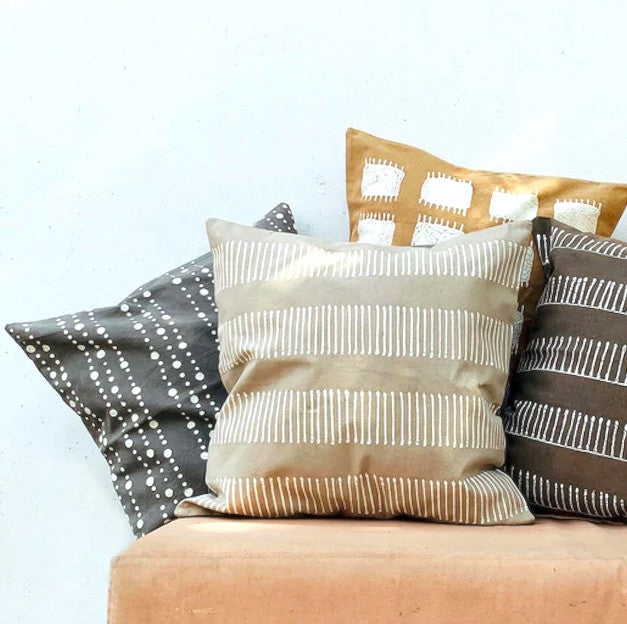 Tribal Cloth Lunar Dots Grey Pillow Cover, installed in a room