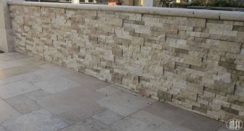 Tuscany Ivory Tumbled Pattern Travertine Pavers in a finished room