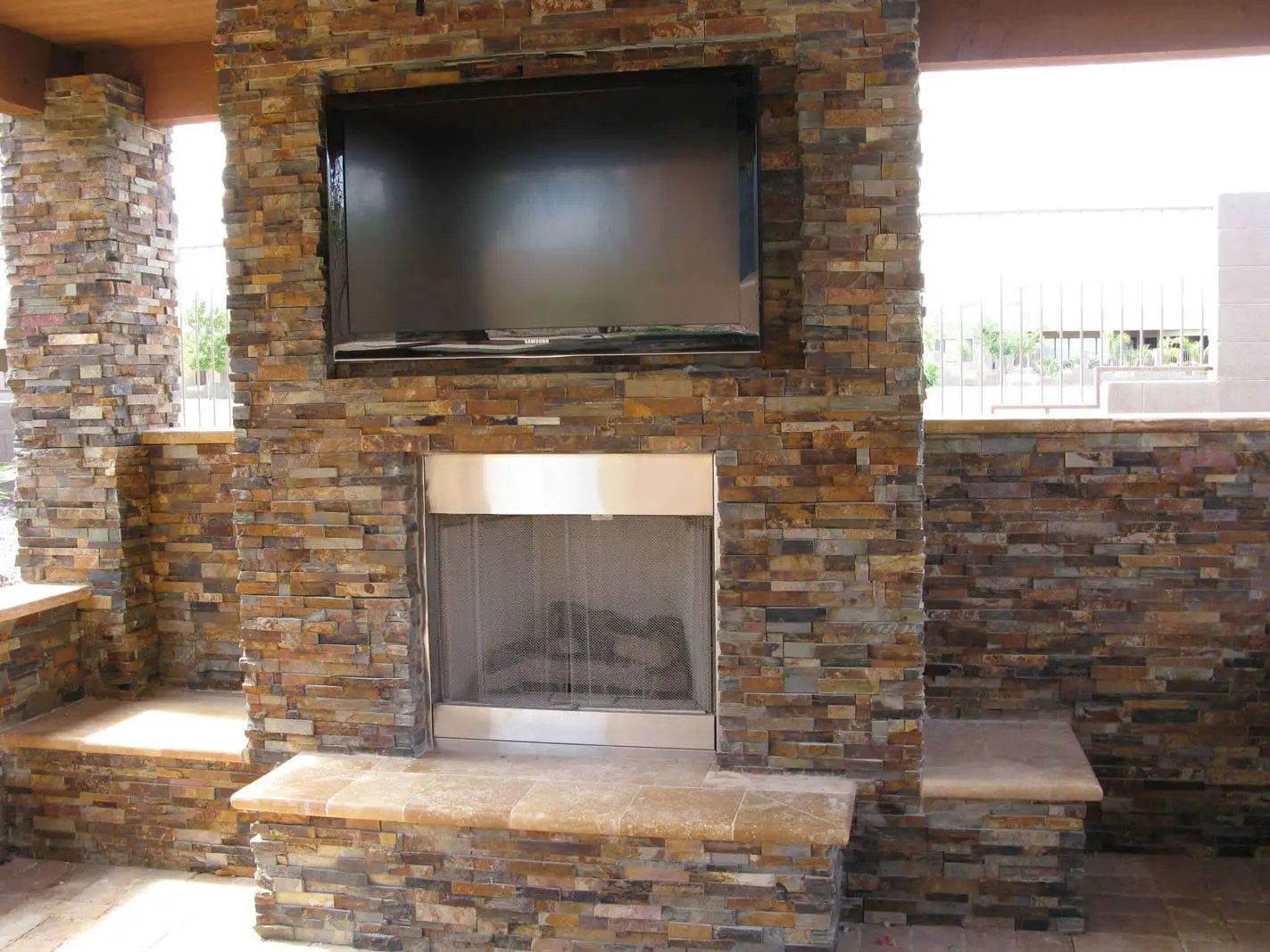 Tuscany Walnut Tumbled Travertine Pavers 16x16 in a finished room