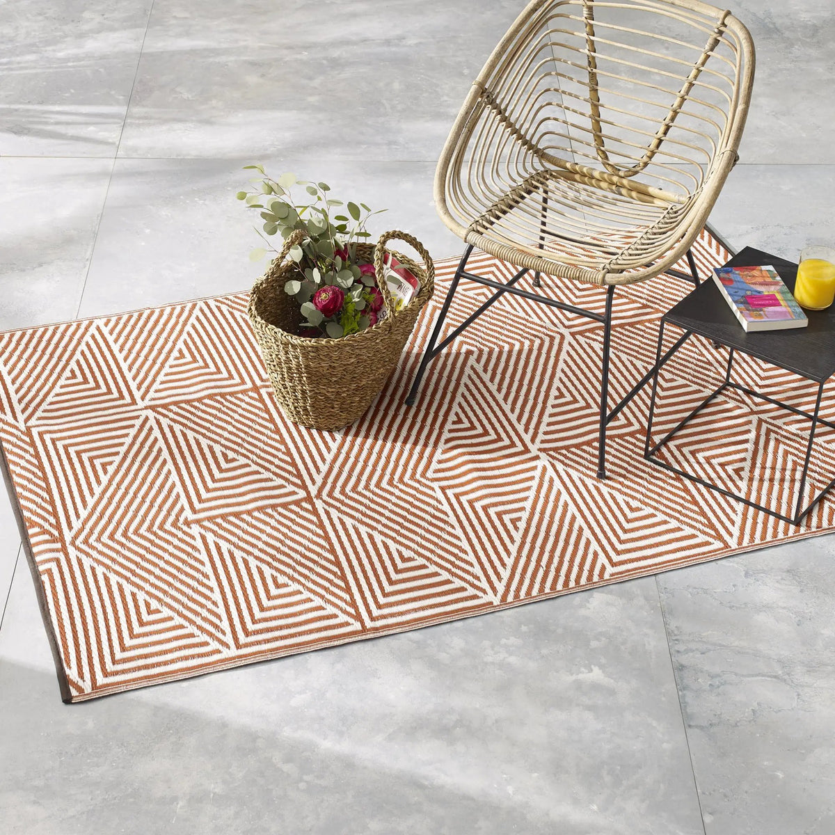 Tokyo - Burnt Orange Outdoor Rug for Patio, installed in a room