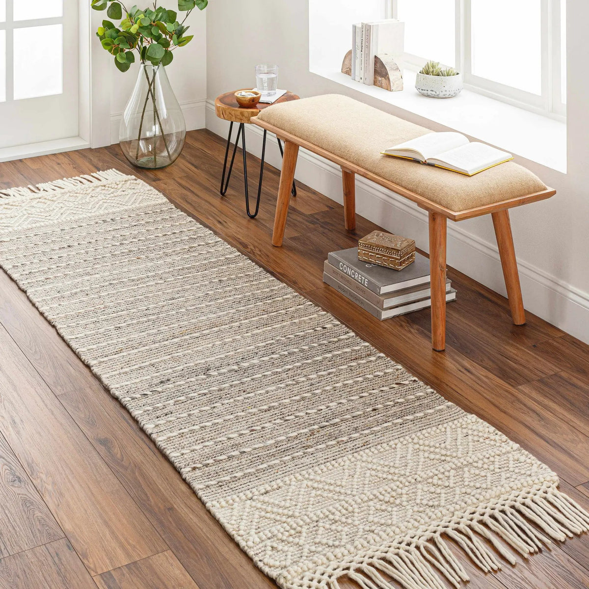 Cream Veruela Wool Blend Braided Tassel Area Rug - Clearance, installed in a room