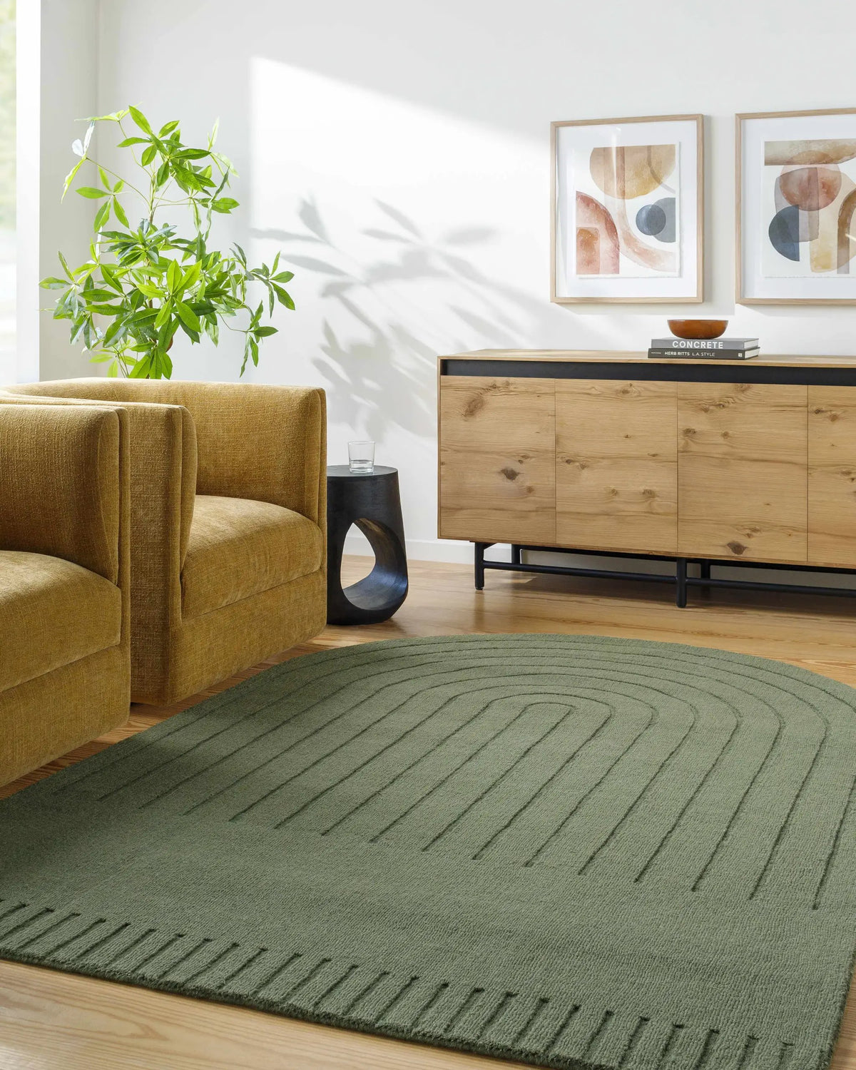 Arnona Green Area Rug, installed in a room
