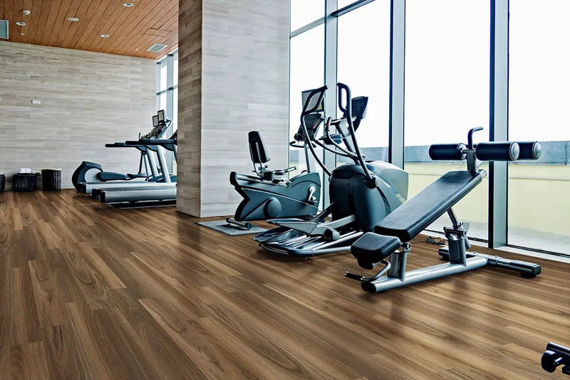 Glenridge Tawny Birch Semi Gloss Quarter Round Wood Look Lvt Moldings 0.64x0.75 in a finished room