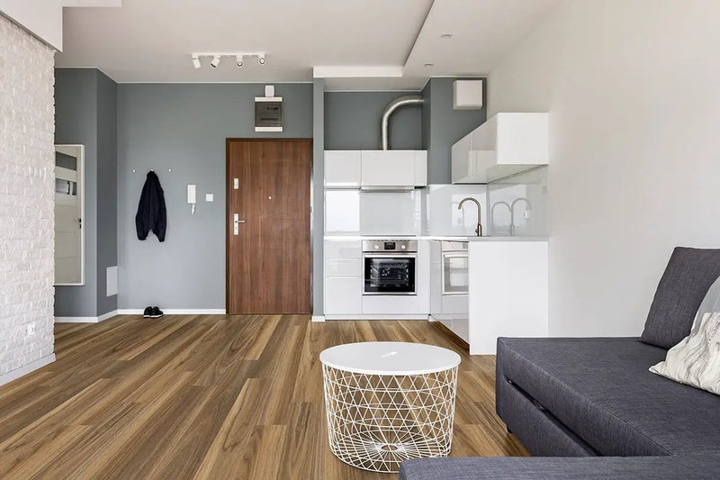 Glenridge Tawny Birch Semi Gloss End Cap Wood Look Lvt Moldings 1.5x0.25 in a finished room