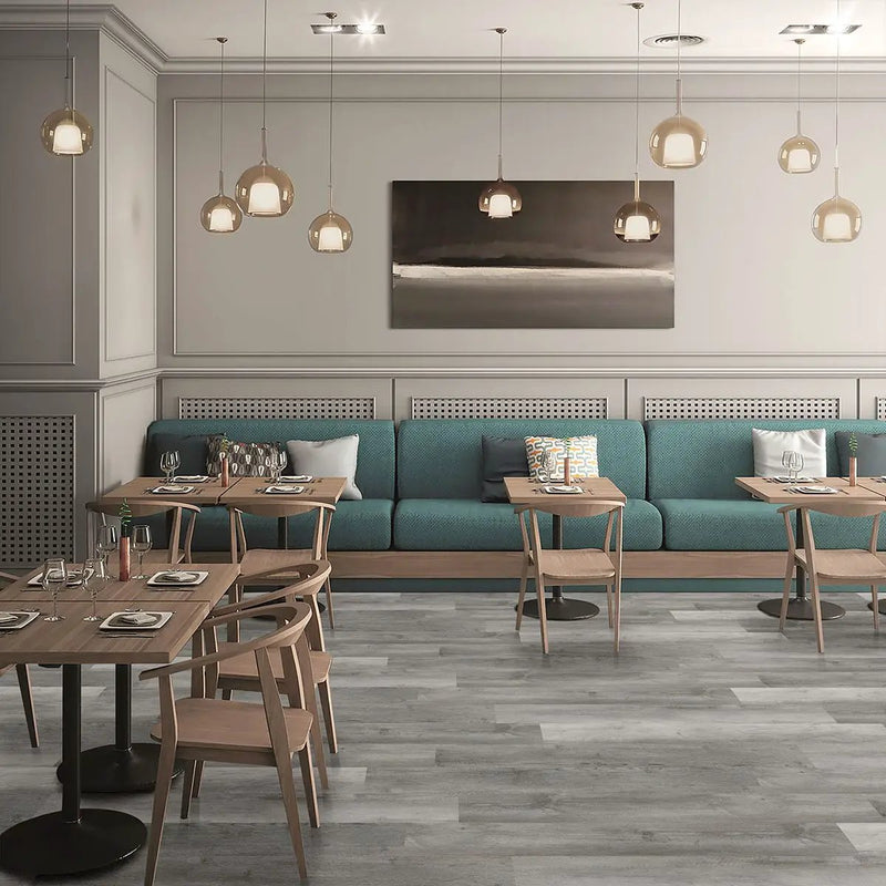 Glenridge Woodrift Gray Semi Gloss Quarter Round Wood Look Lvt Moldings 0.64x0.75 in a finished room