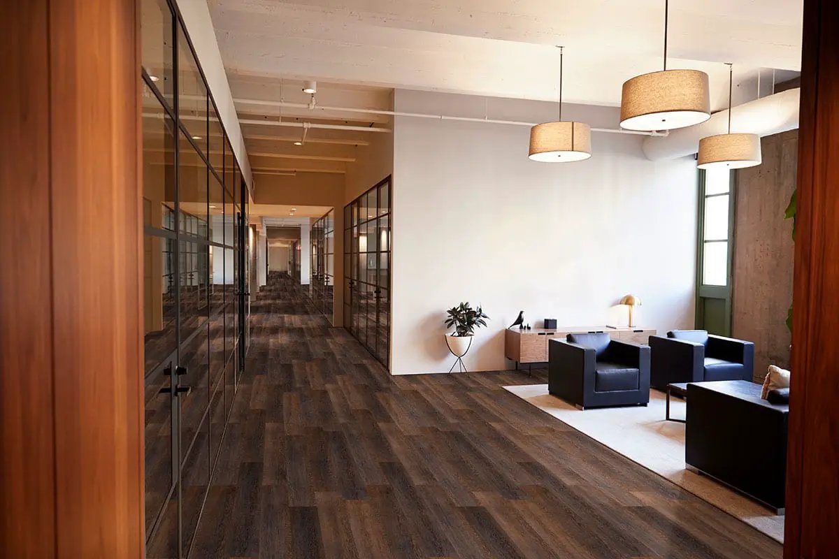 Smithcliffs Hillsdale Semi Gloss Wood Look Rigid Core Moldings 12x1.25 in a finished room
