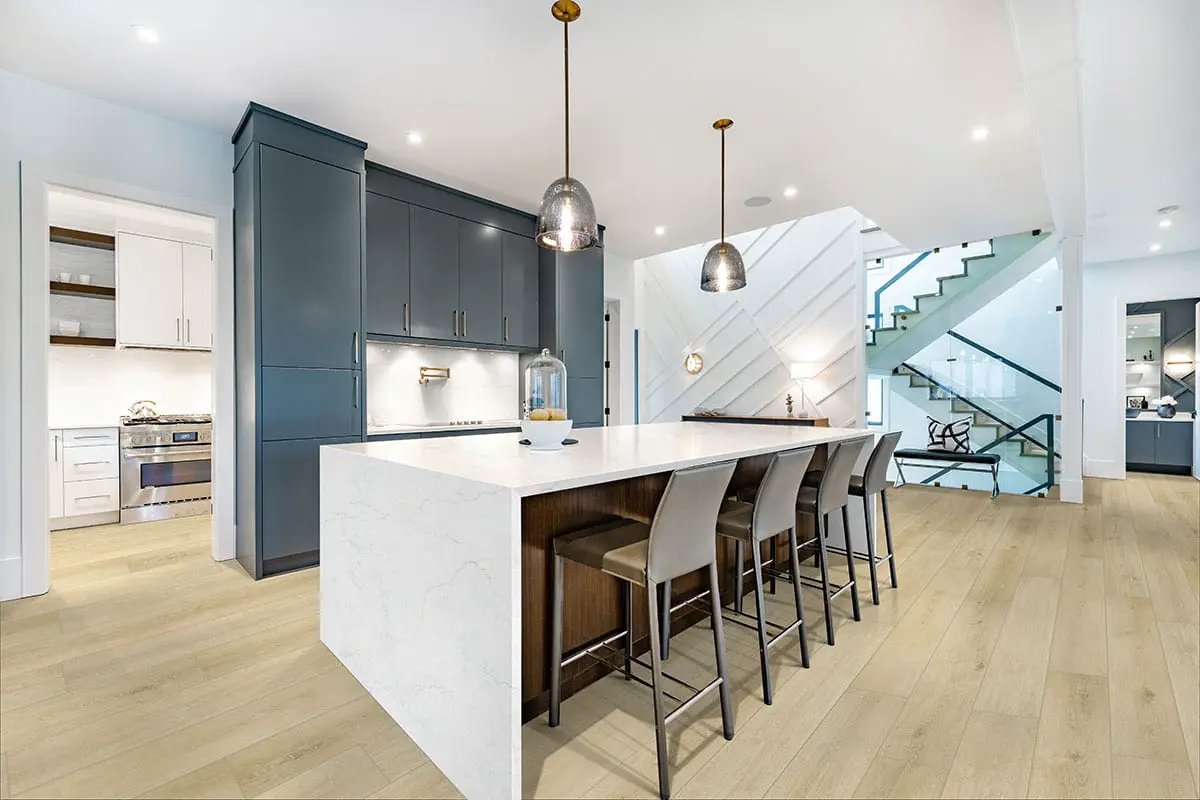 Smithcliffs Lanston Oak Semi Gloss Overlap Stair Nose Wood Look Rigid Core Moldings 2.23x1.03 in a finished room
