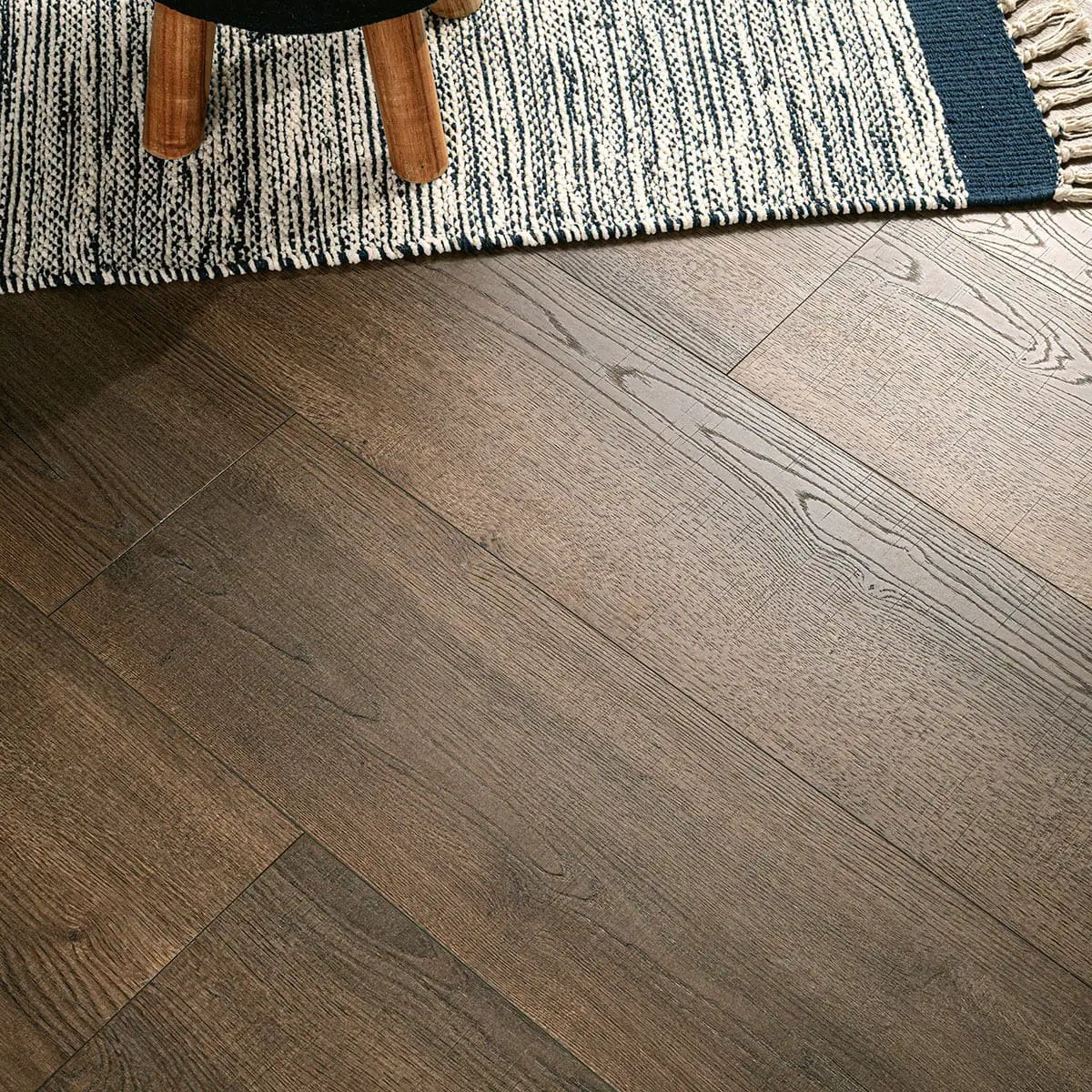 Shorecliffs Roghan Semi Gloss Overlap Stair Nose Wood Look Rigid Core Moldings 2.23x1.03 in a finished room