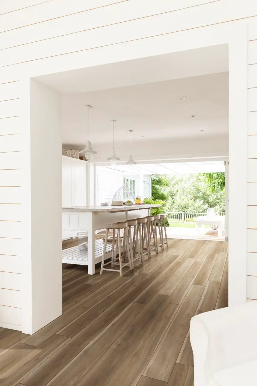 Andover Bayhill Blonde Semi Gloss T Molding Wood Look Lvt Moldings 1.77x0.28 in a finished room
