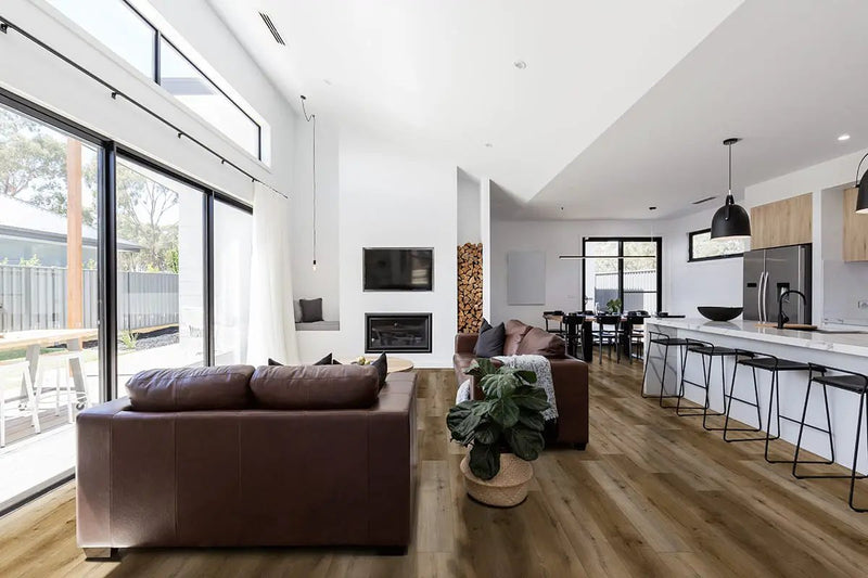 Andover Blythe Semi Gloss Quarter Round Wood Look Lvt Moldings 0.64x0.75 in a finished room