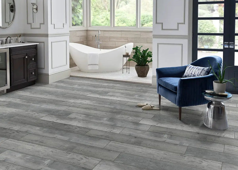 Andover Kingsdown Gray Semi Gloss Quarter Round Wood Look Lvt Moldings 0.64x0.75 in a finished room