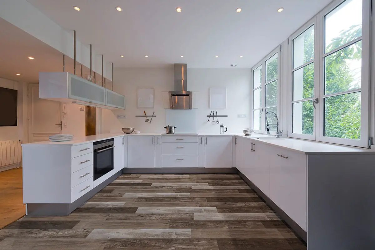 Cyrus Weathered Brina Semi Gloss End Cap Wood Look Lvt Moldings 1.5x0.25 in a finished room