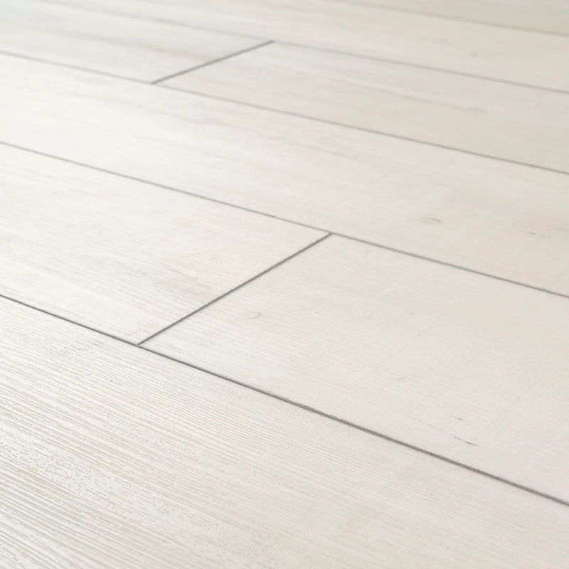 Andover Whitby White Semi Gloss End Cap Wood Look Lvt Moldings 1.5x0.25 angled view