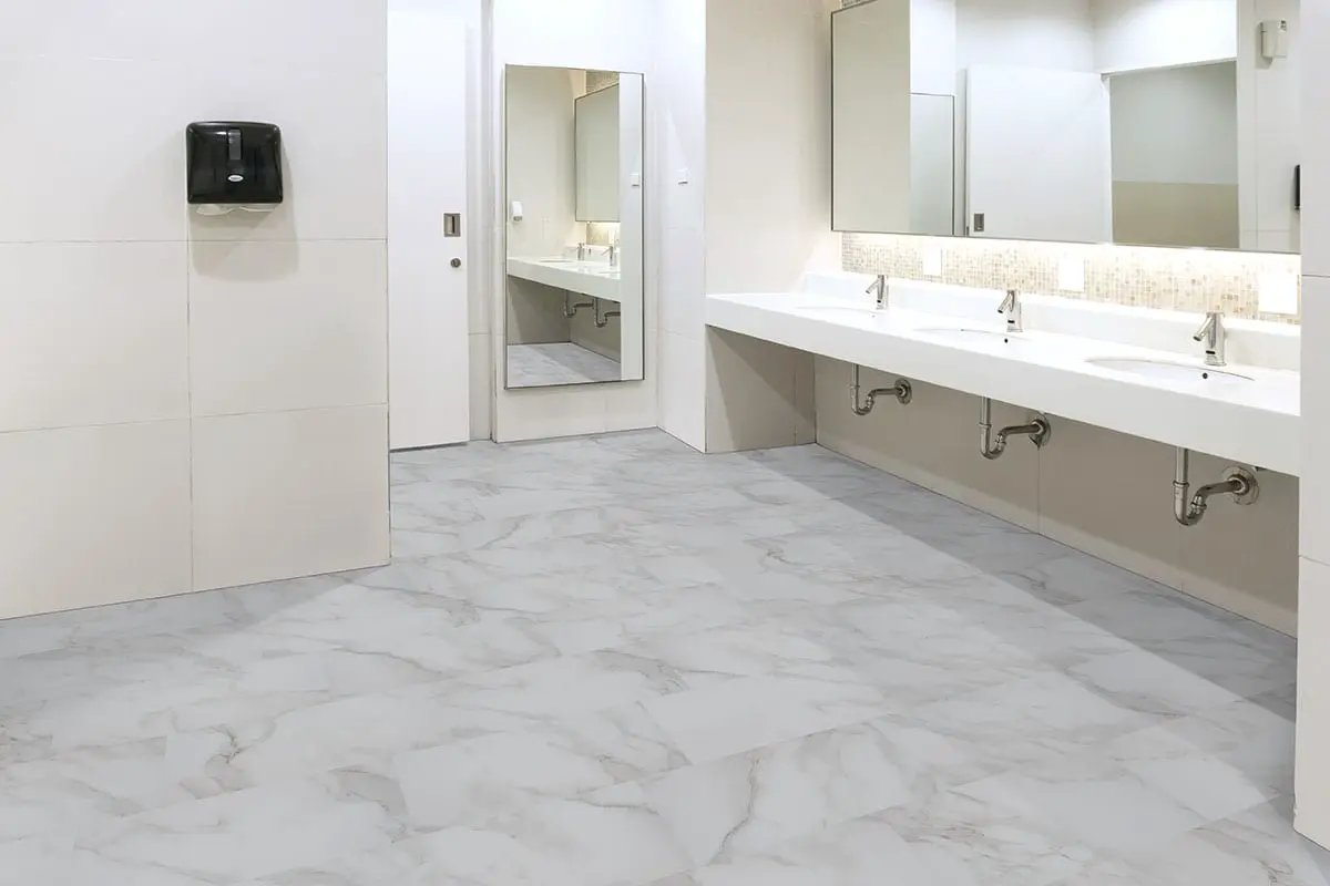 Trecento Calacatta Venosa Gold Semi Gloss Stair Riser Marble Look Lvt Moldings 1.5x0.25 in a finished room