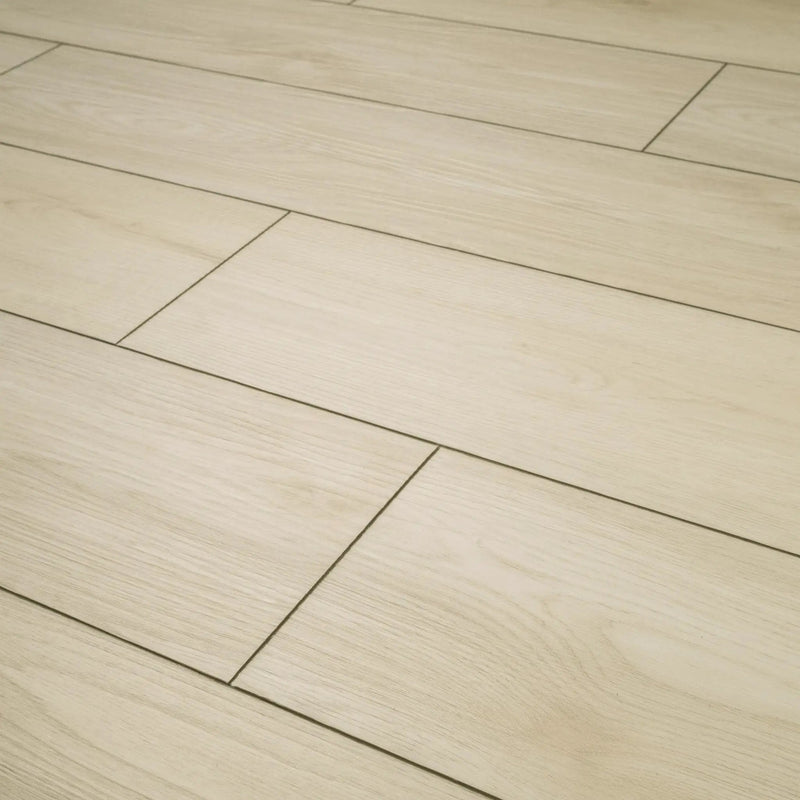 Andover Vintaj Semi Gloss End Cap Wood Look Lvt Moldings 1.5x0.25 angled view