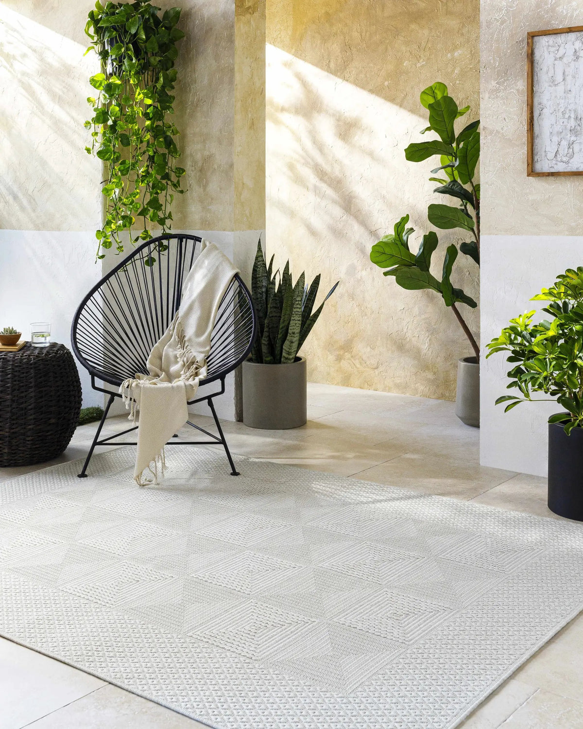 Anabia White Outdoor Area Rug, installed in a room