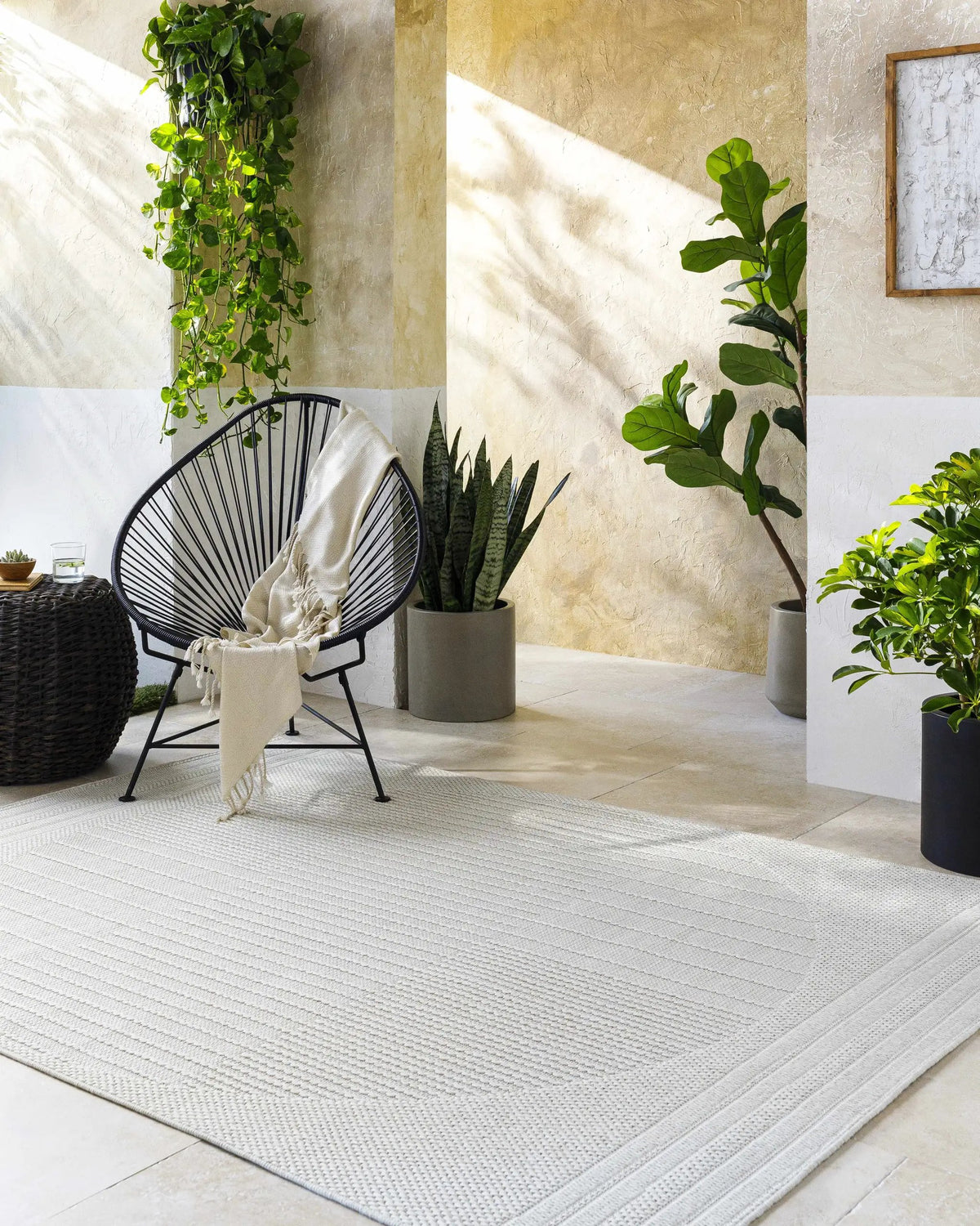 Yuley White Outdoor Area Rug, installed in a room