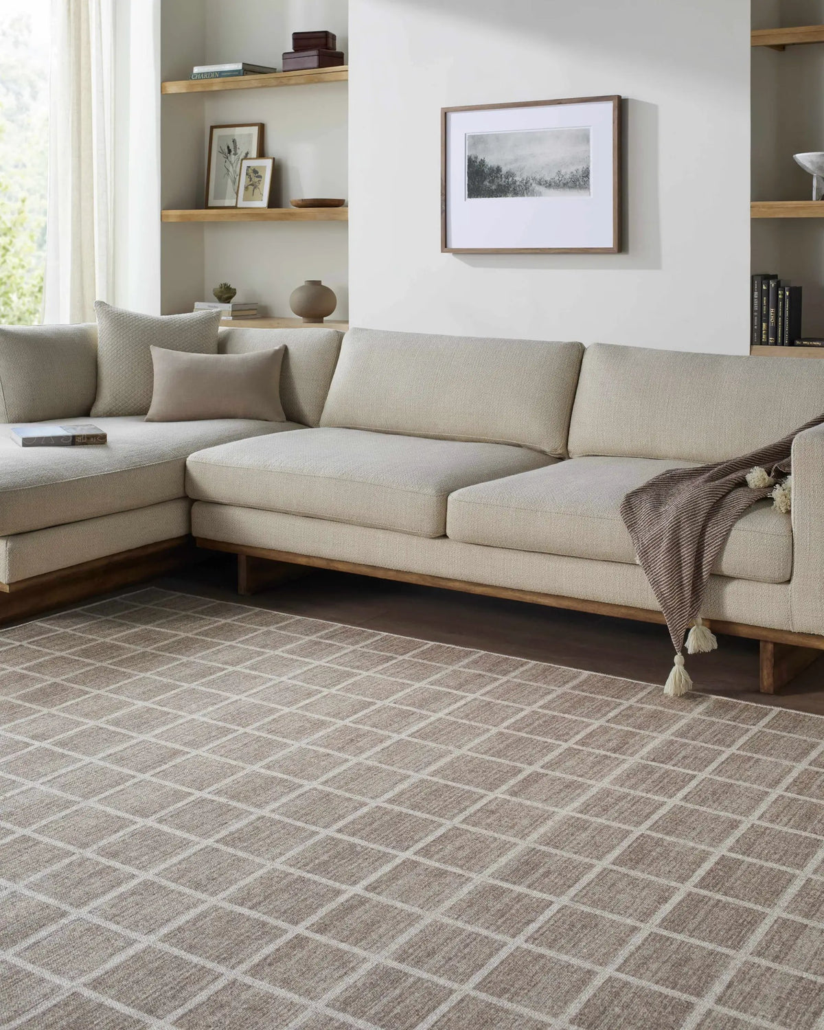 Anicet Checkered Washable Wool Area Rug, installed in a room