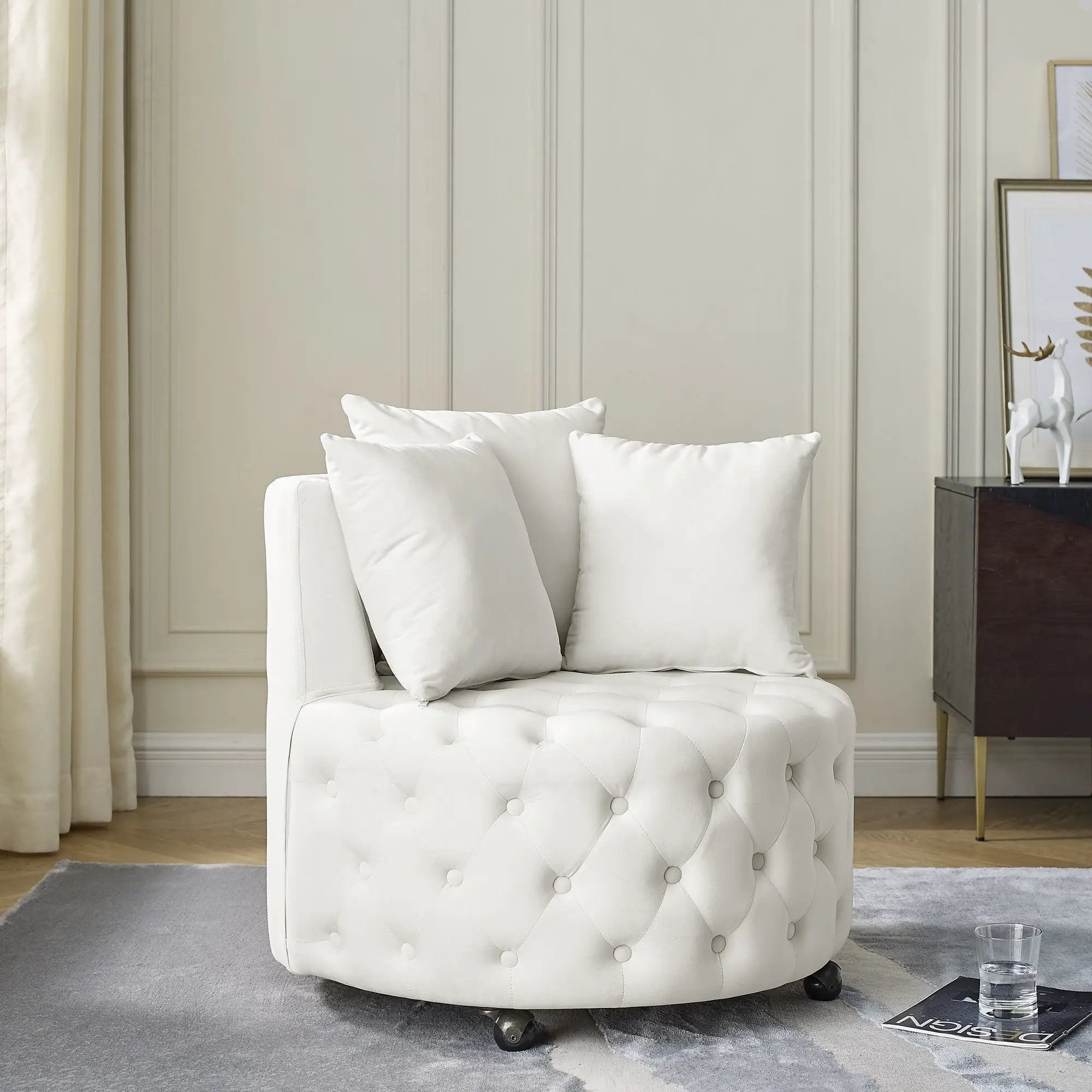 Modern Upholstered Swivel Chair With Button Tufted Design And Movable Wheels by HouseOfZazla