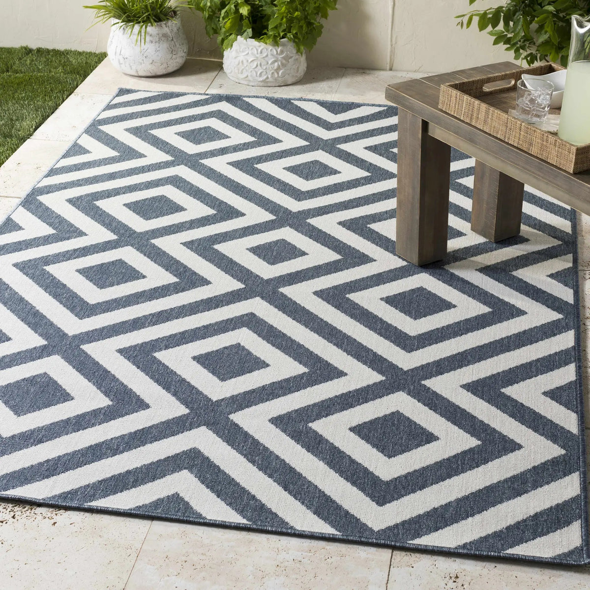 Spilsby Navy Blue Outdoor Rug - Clearance, installed in a room