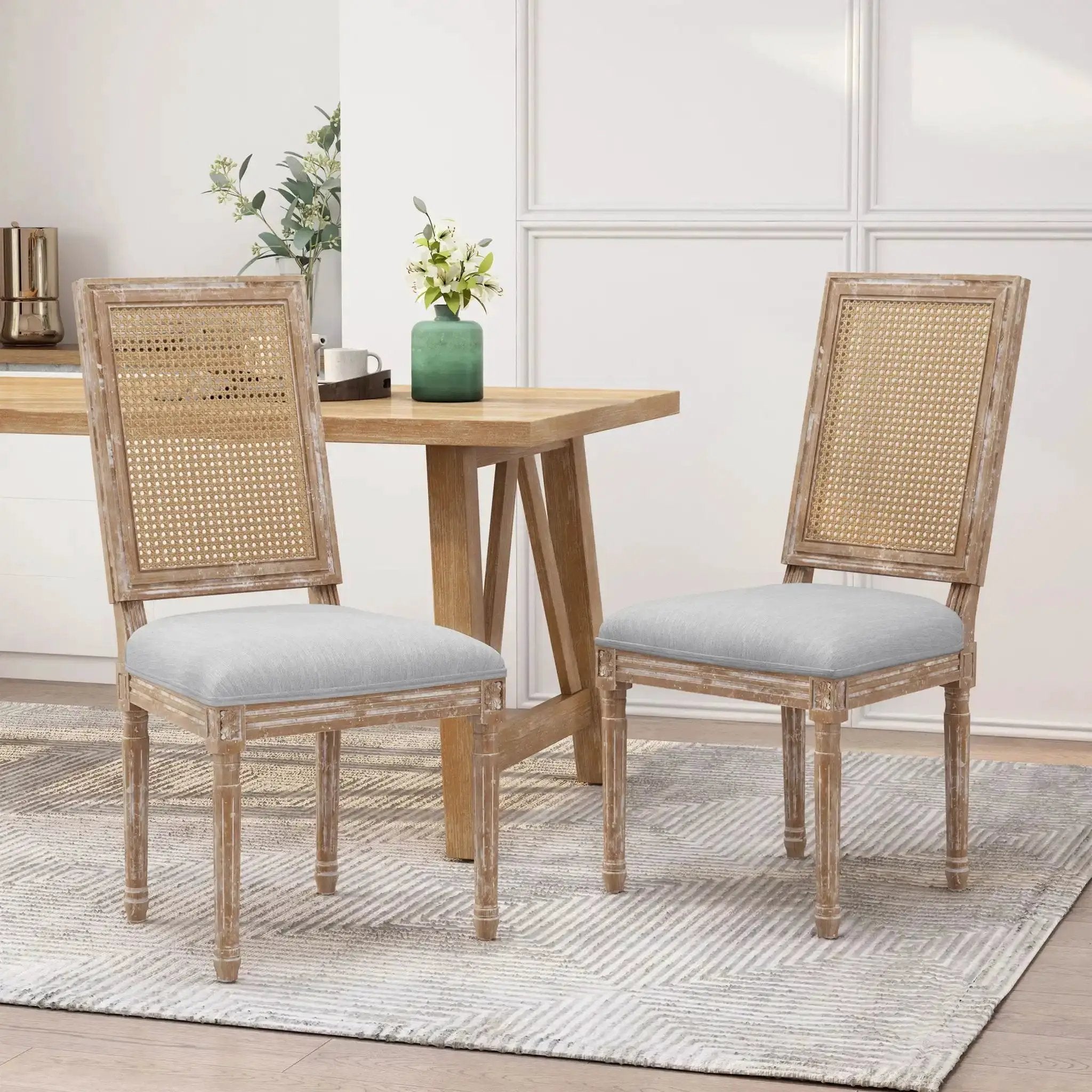 French Country Dining Chair With Rectangular Cane Backrest And Smooth Upholstered Seating by HouseOfZazla