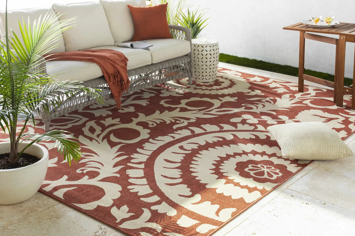 Alburnett Burnt Orange Floral Outdoor Rug - Clearance, installed in a room 4