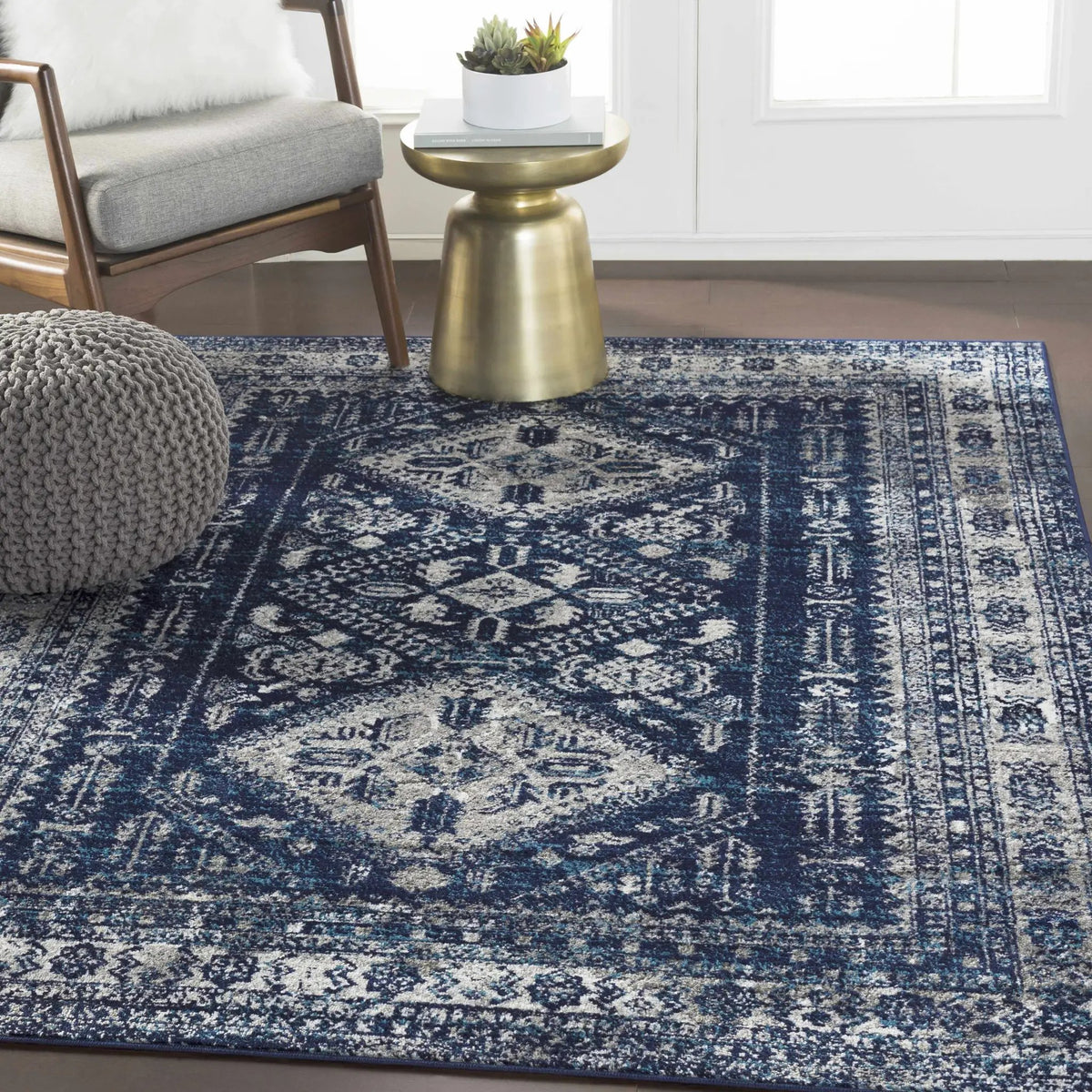 Andes Blue Area Rug, installed in a room
