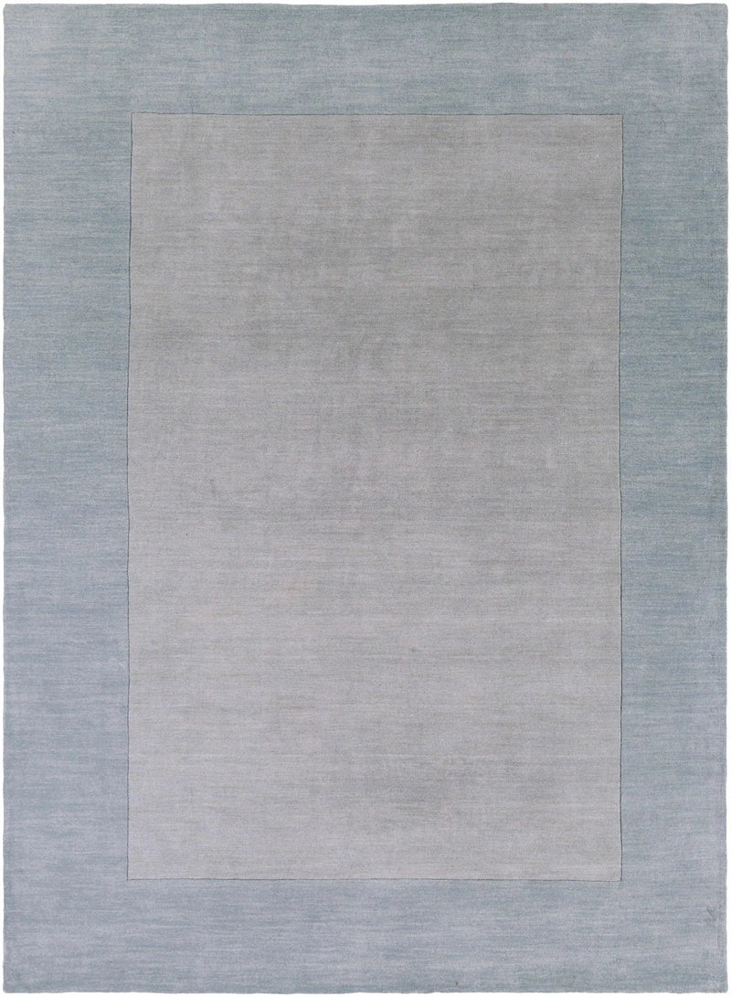Arkabutla Solid Blue Bordered Wool Rug by Boutique Rugs