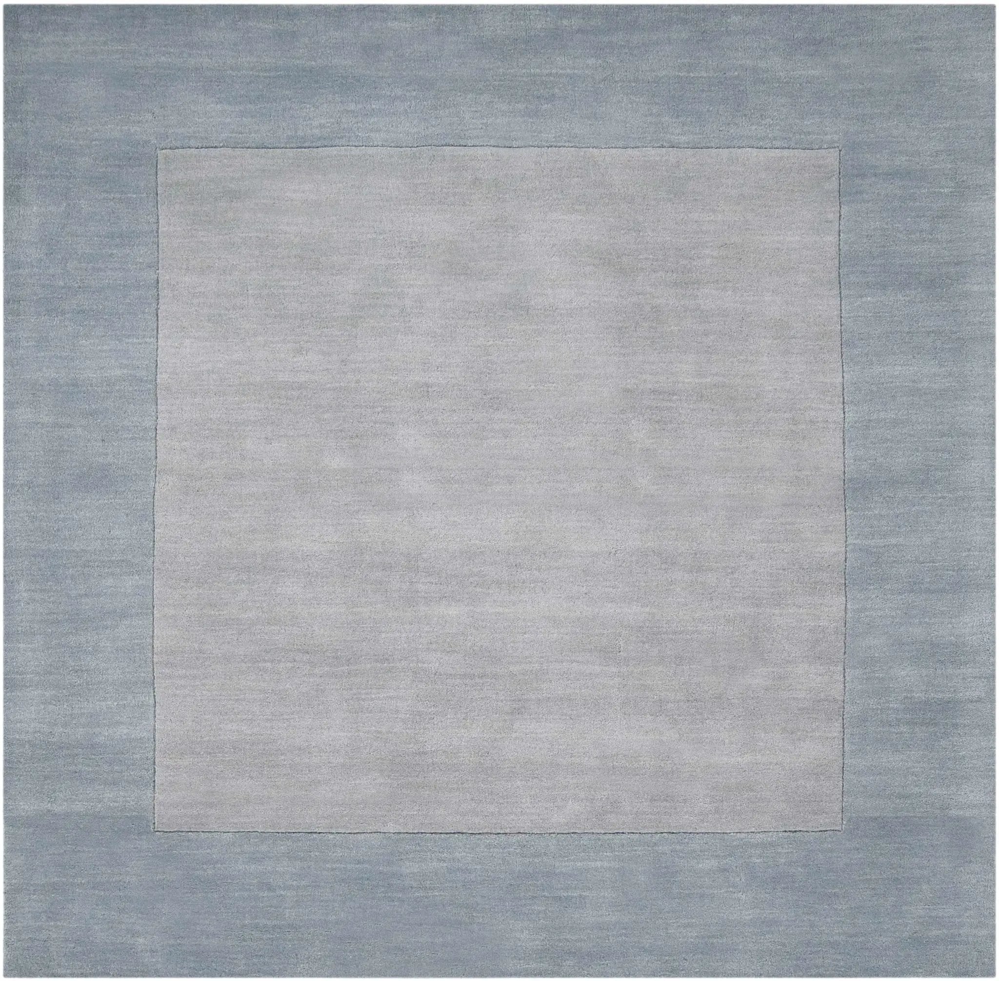 Arkabutla Solid Blue Bordered Wool Rug by Boutique Rugs