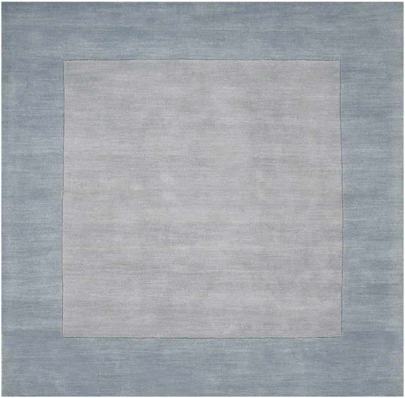 Arkabutla Solid Blue Bordered Wool Rug by Boutique Rugs