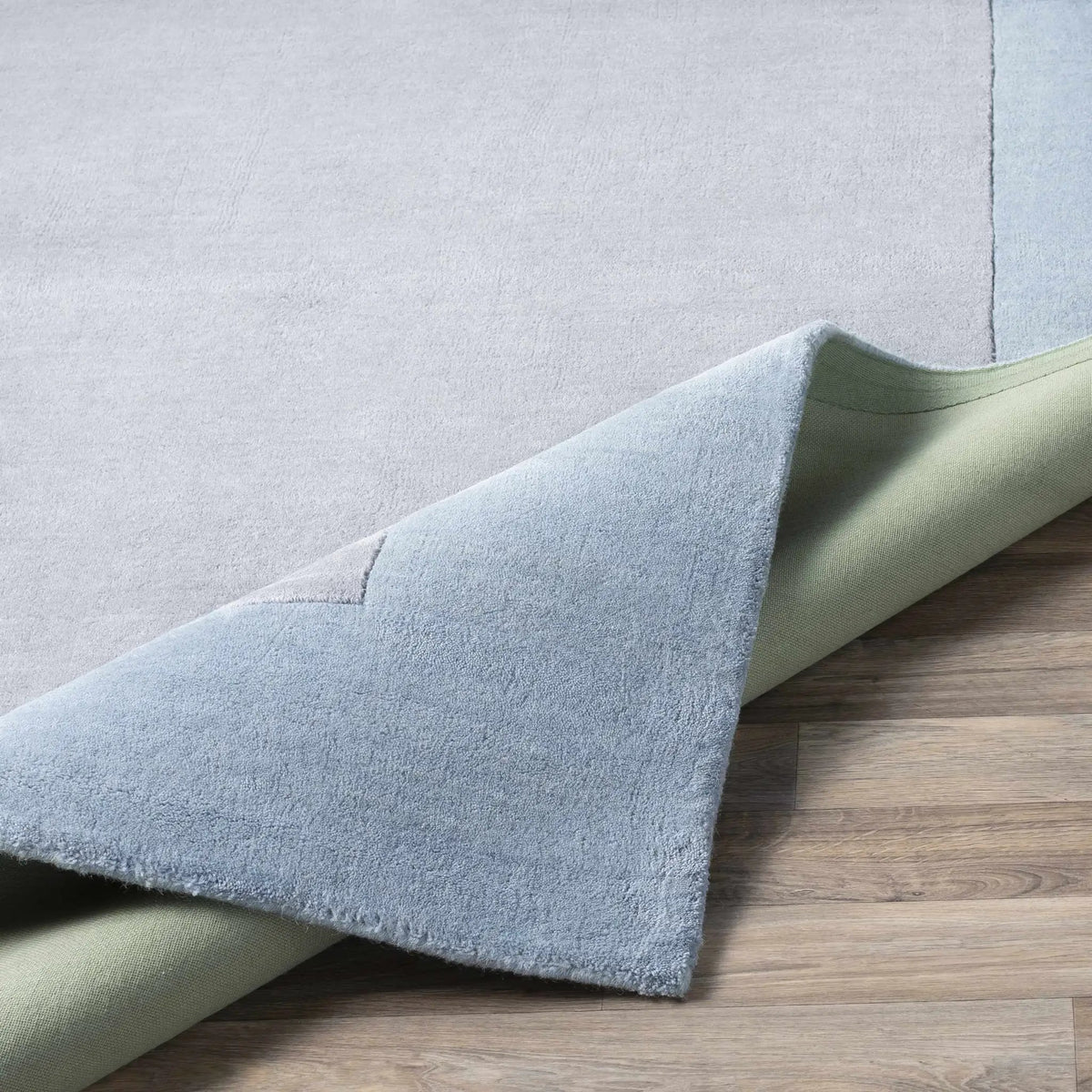 Arkabutla Solid Blue Bordered Wool Rug, photo 9 of 16